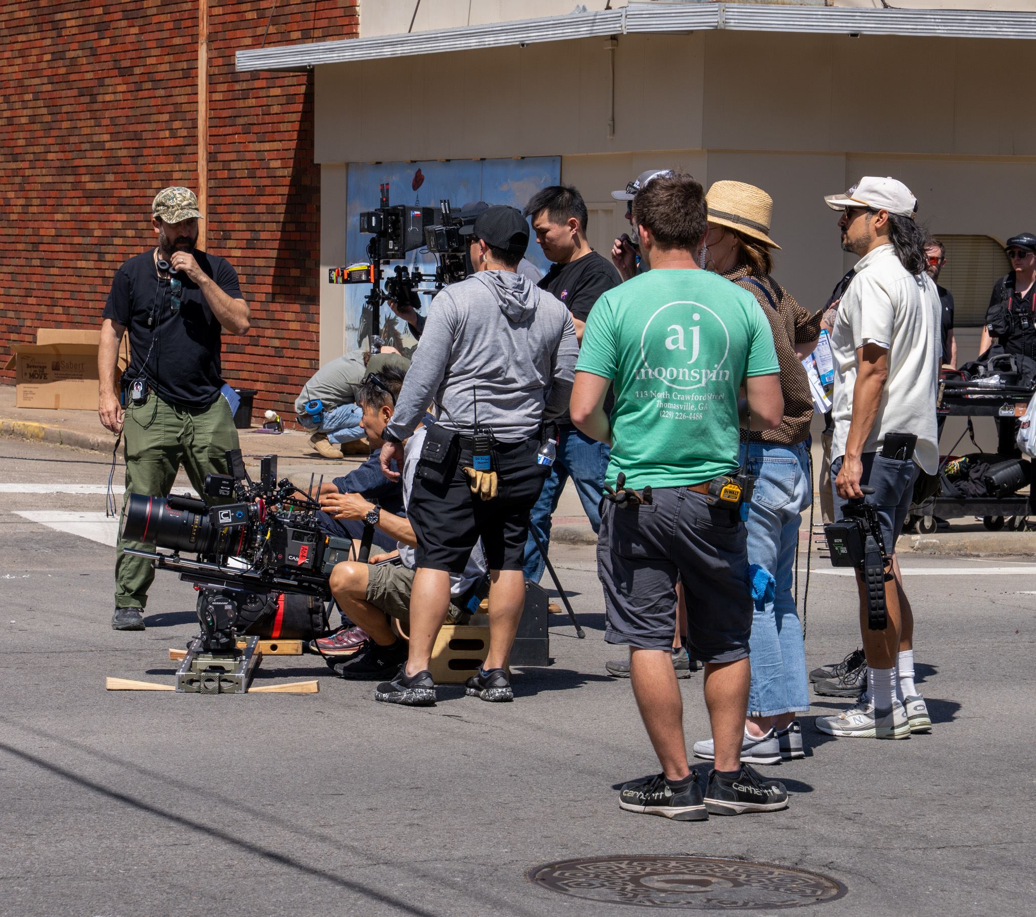 film crew with camera recording video near 100 block of Lamar Avenue, Paris, Texas