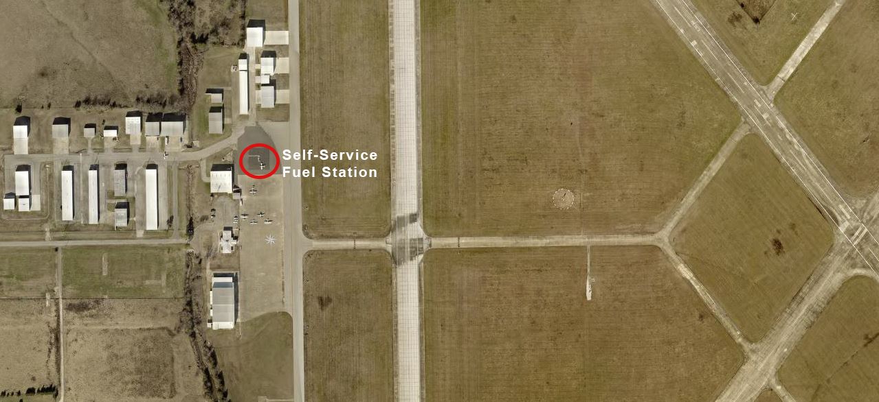 Aerial image of Cox Field with self-service fuel station location marked with a red circle