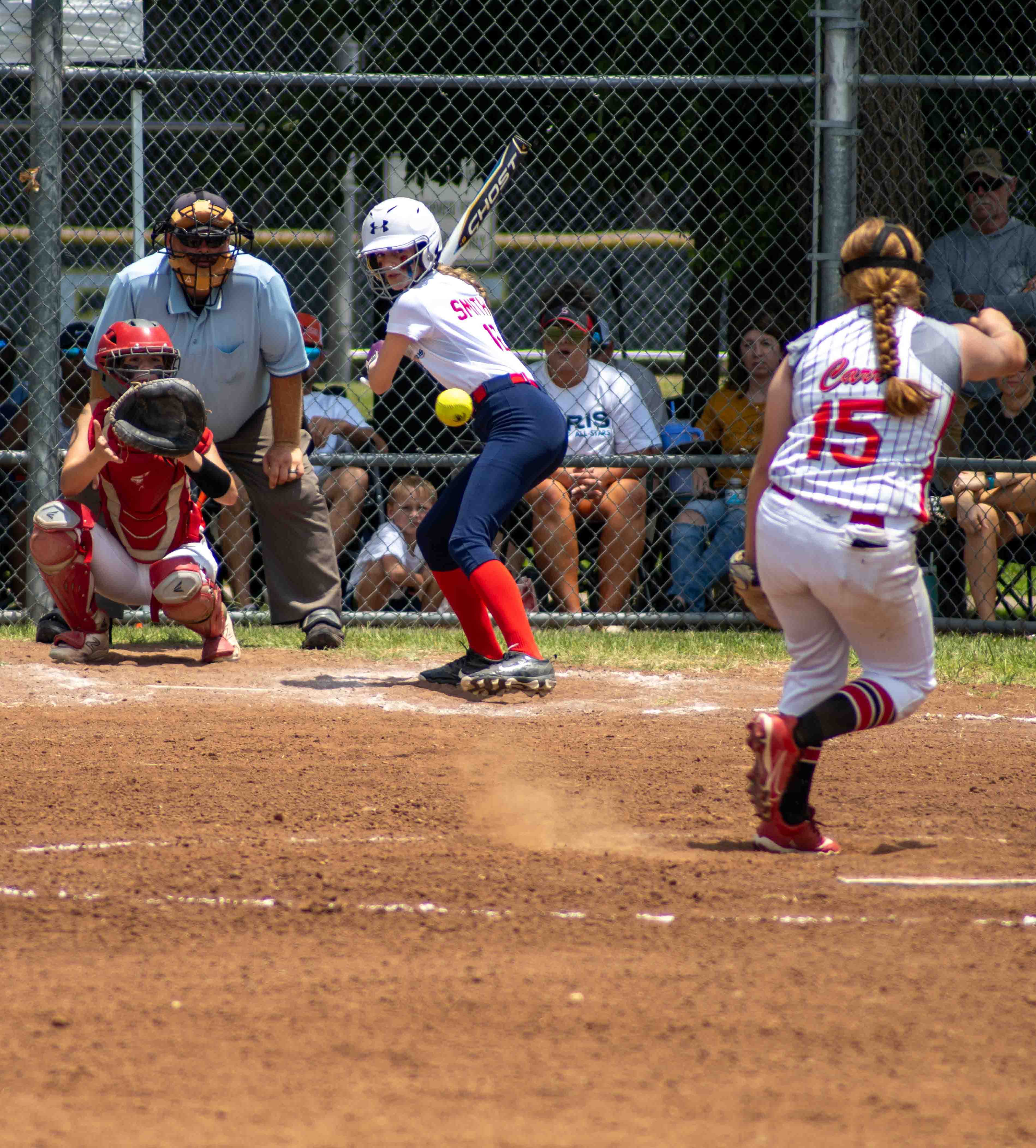 youth girls playing softball